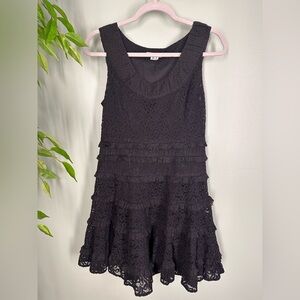 Kenzie sleeveless, black lace dress with ruffles. Fully lined. Size M.